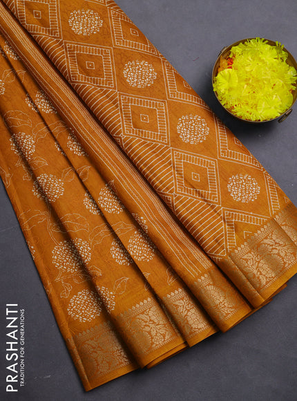 Semi dola saree mustard yellow with floral prints & self emboss and zari woven border