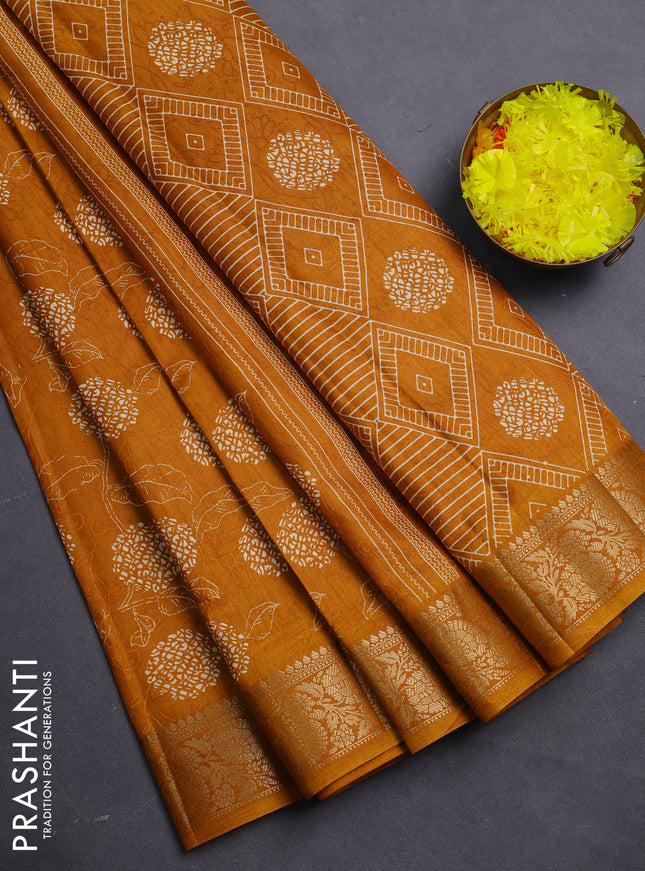 Semi dola saree mustard yellow with floral prints & self emboss and zari woven border