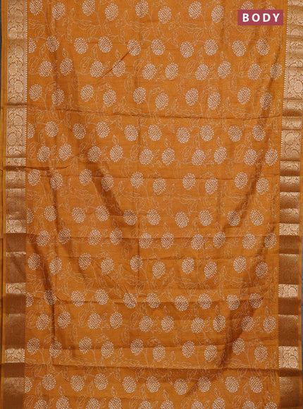 Semi dola saree mustard yellow with floral prints & self emboss and zari woven border