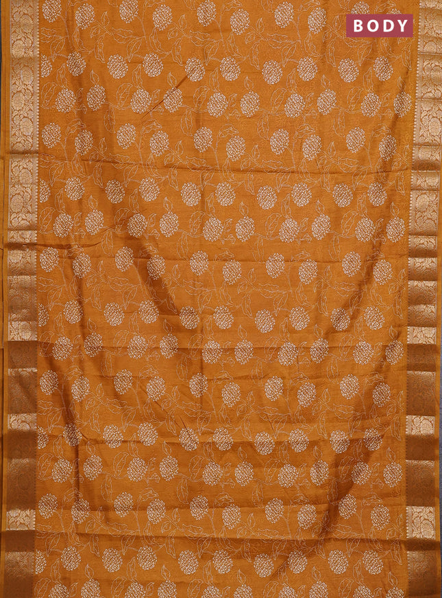 Semi dola saree mustard yellow with floral prints & self emboss and zari woven border