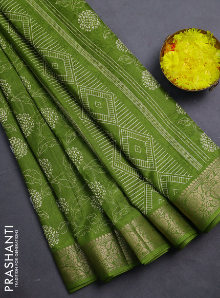 Semi dola saree mehendi green with floral prints & self emboss and zari woven border