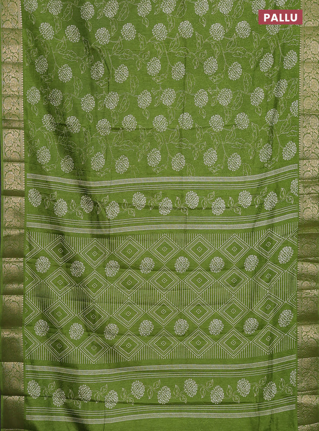 Semi dola saree mehendi green with floral prints & self emboss and zari woven border