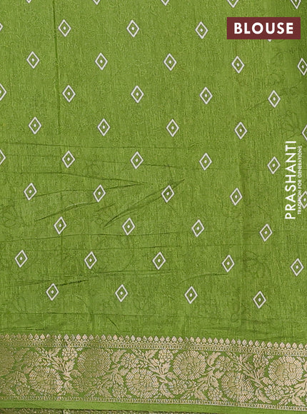 Semi dola saree mehendi green with floral prints & self emboss and zari woven border