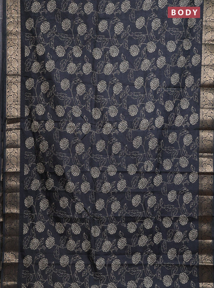 Semi dola saree black with floral prints & self emboss and zari woven border