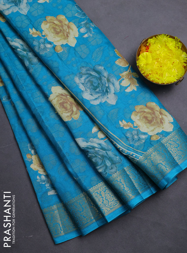 Semi dola saree cs blue with floral prints & zari weaves and zari woven border