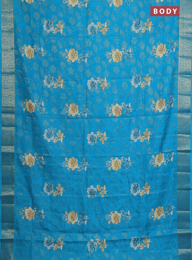 Semi dola saree cs blue with floral prints & zari weaves and zari woven border