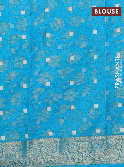 Semi dola saree cs blue with floral prints & zari weaves and zari woven border