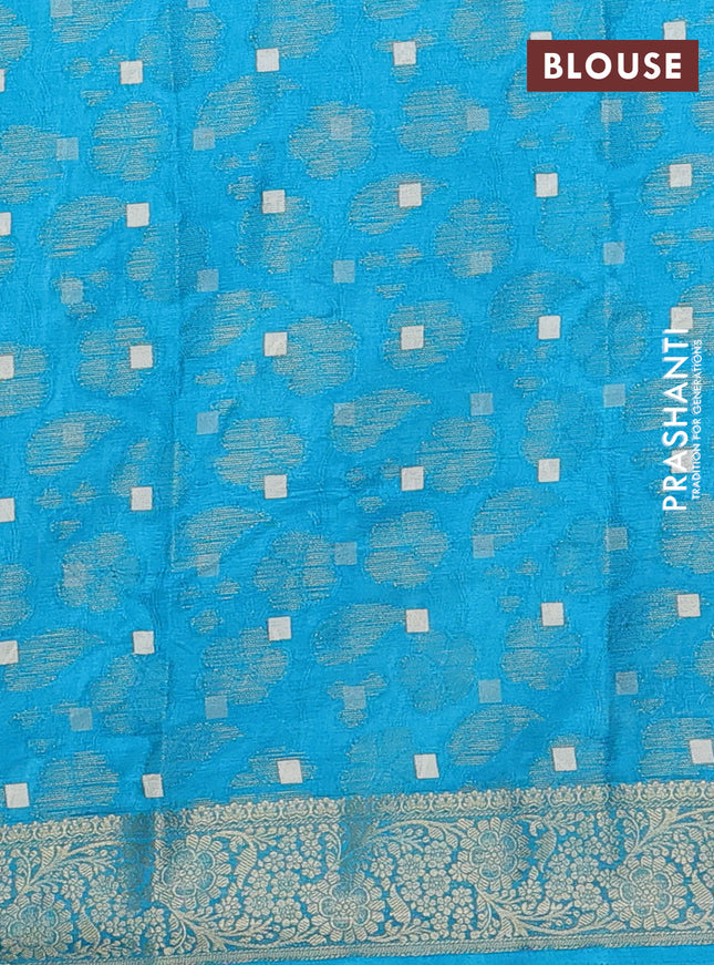 Semi dola saree cs blue with floral prints & zari weaves and zari woven border