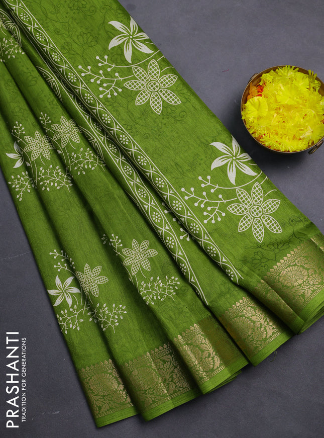 Semi dola saree mehendi green with floral prints & self emboss and zari woven border