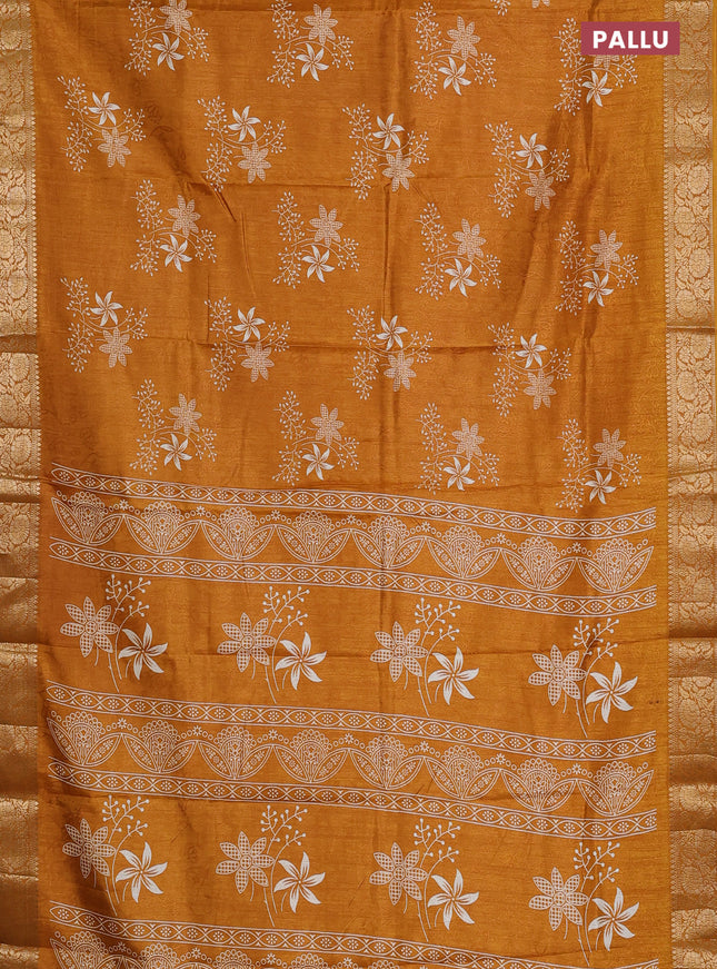 Semi dola saree mustard yellow with floral prints & self emboss and zari woven border
