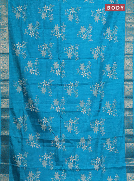 Semi dola saree teal blue with floral prints & self emboss and zari woven border