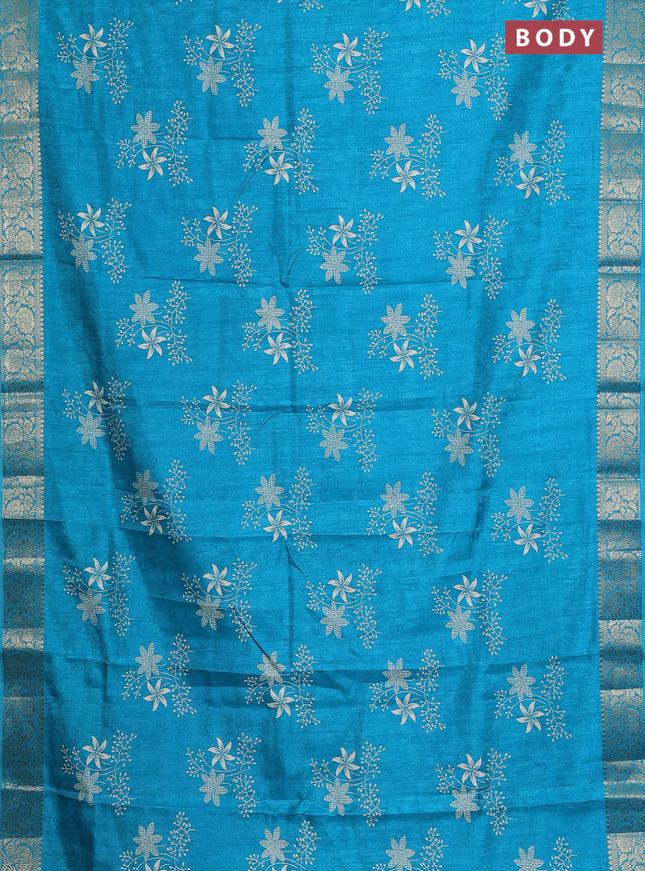 Semi dola saree teal blue with floral prints & self emboss and zari woven border