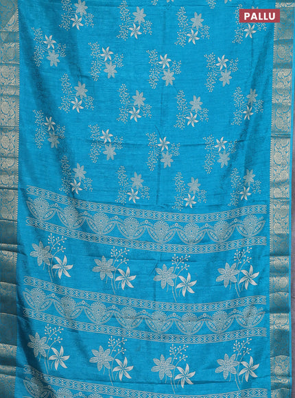 Semi dola saree teal blue with floral prints & self emboss and zari woven border