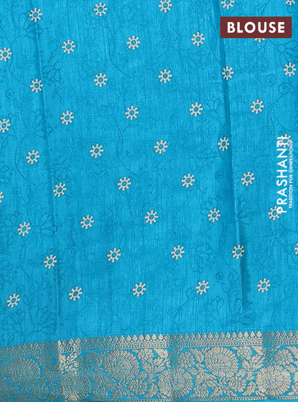 Semi dola saree teal blue with floral prints & self emboss and zari woven border