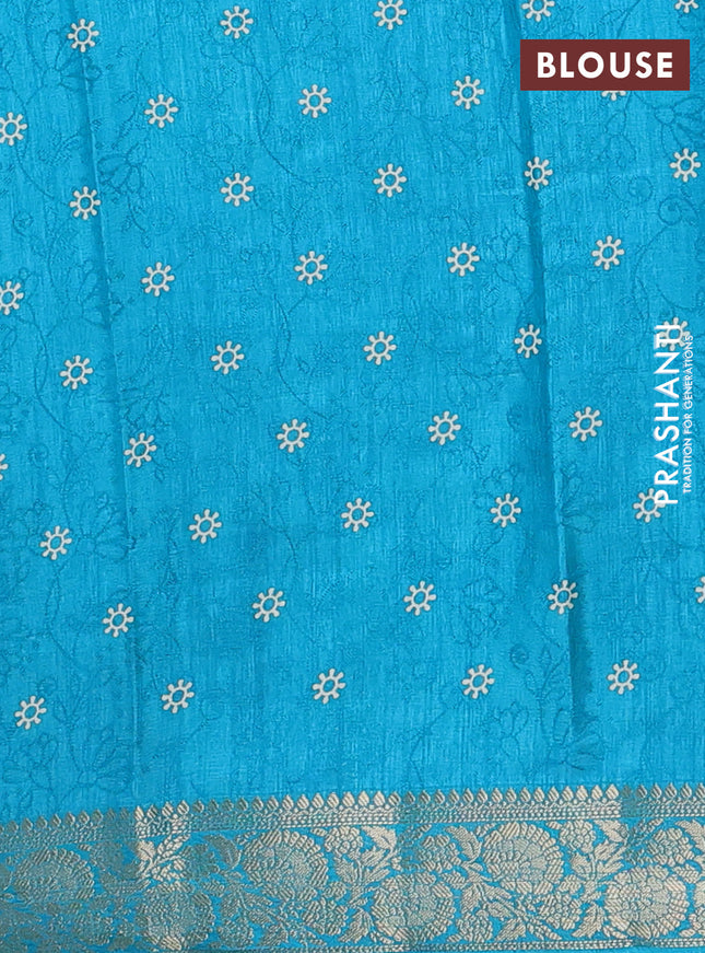 Semi dola saree teal blue with floral prints & self emboss and zari woven border