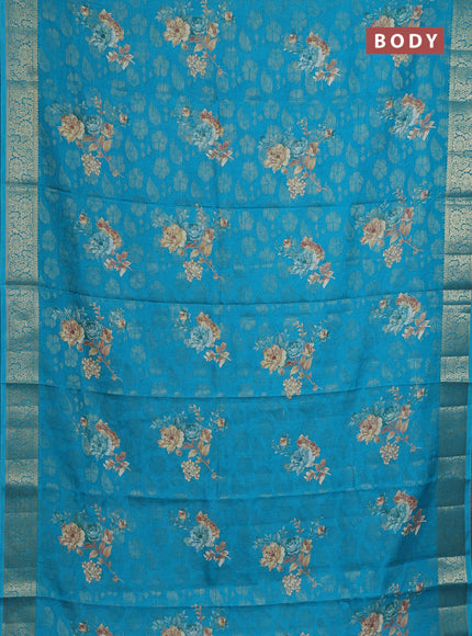 Semi dola saree cs blue with floral prints & zari weaves and zari woven border