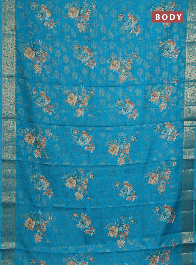 Semi dola saree cs blue with floral prints & zari weaves and zari woven border