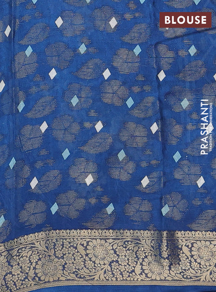 Semi dola saree peacock blue with floral prints & zari weaves and zari woven border