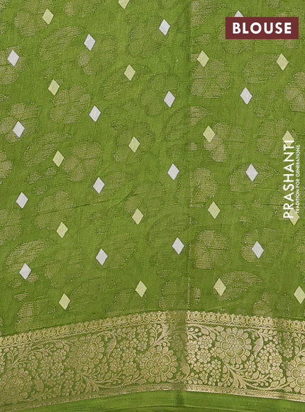 Semi dola saree green with floral prints & zari weaves and zari woven border