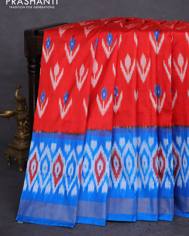 Pochampally silk saree red and cs blue with allover ikat butta weaves and ikat woven zari border