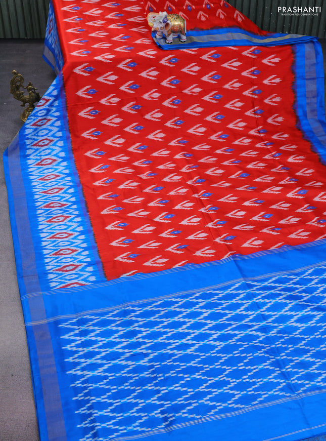 Pochampally silk saree red and cs blue with allover ikat butta weaves and ikat woven zari border