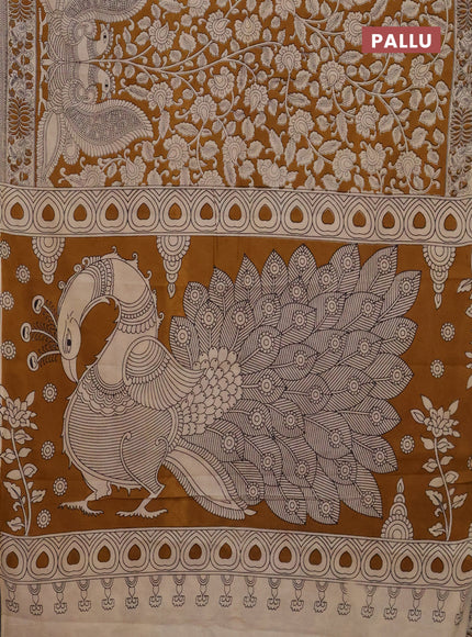 Kalamkari cotton saree dark mustard and beige with allover prints and printed border