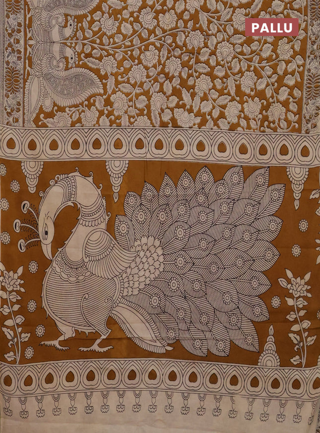 Kalamkari cotton saree dark mustard and beige with allover prints and printed border
