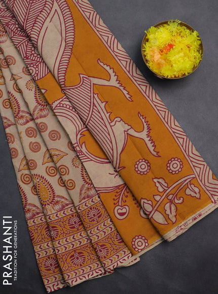 Kalamkari cotton saree beige and orange with allover prints and printed border