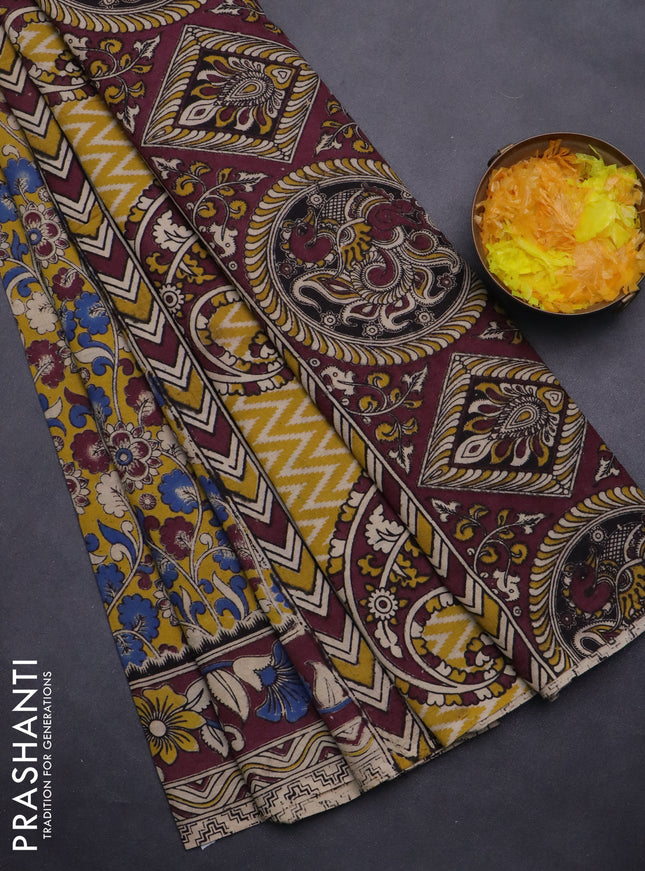 Kalamkari cotton saree yellow and wine shade with allover prints and printed border