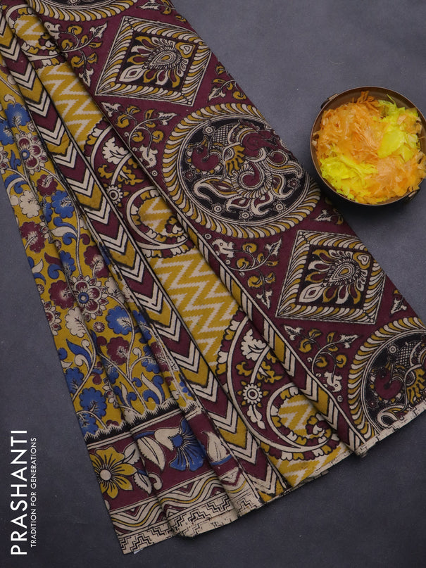 Kalamkari cotton saree yellow and wine shade with allover prints and printed border