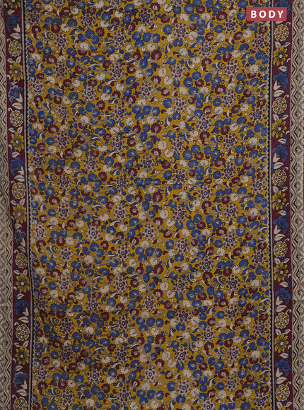 Kalamkari cotton saree yellow and wine shade with allover prints and printed border