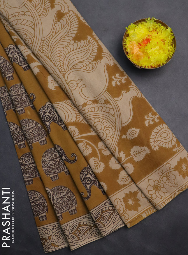 Kalamkari cotton saree dark mustard and beige with elephant butta prints and printed border