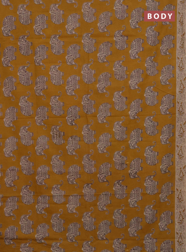 Kalamkari cotton saree dark mustard and beige with elephant butta prints and printed border