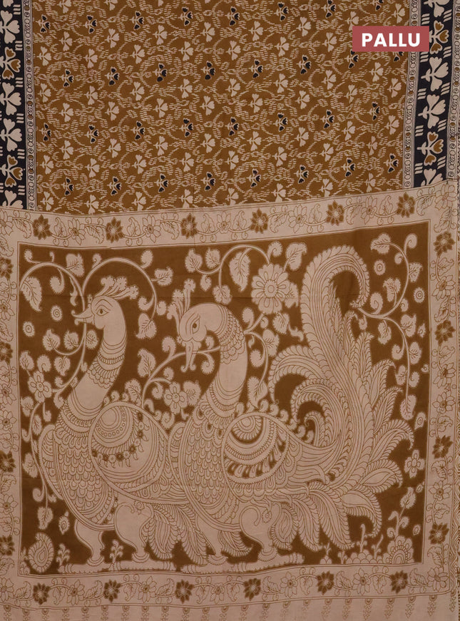 Kalamkari cotton saree dark mustard and black with allover prints and printed border