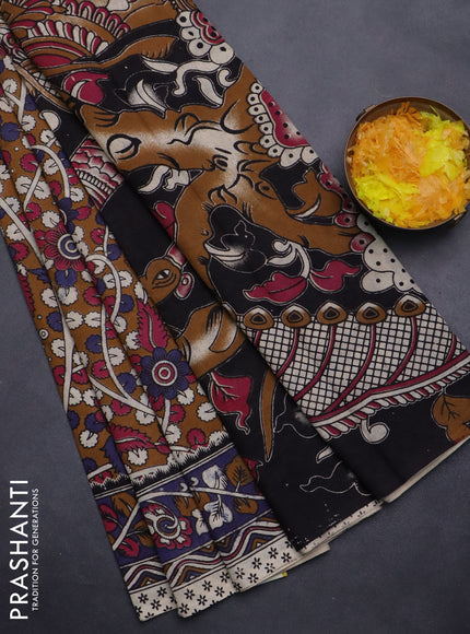 Kalamkari cotton saree dark mustard and blue shade with allover prints and printed border