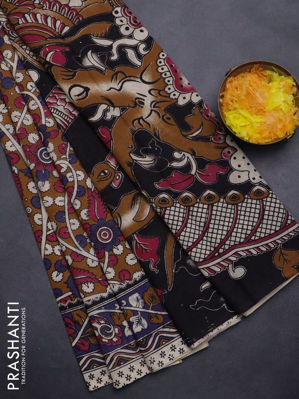 Kalamkari cotton saree dark mustard and blue shade with allover prints and printed border