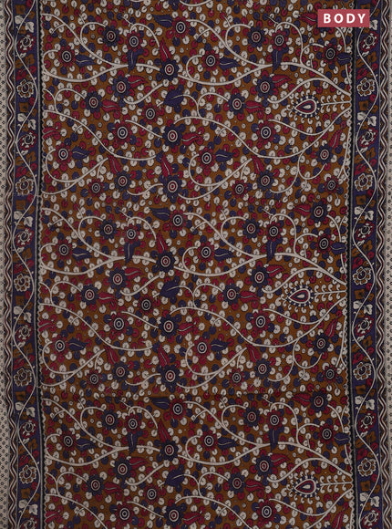 Kalamkari cotton saree dark mustard and blue shade with allover prints and printed border