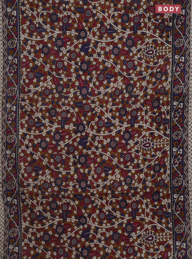 Kalamkari cotton saree dark mustard and blue shade with allover prints and printed border