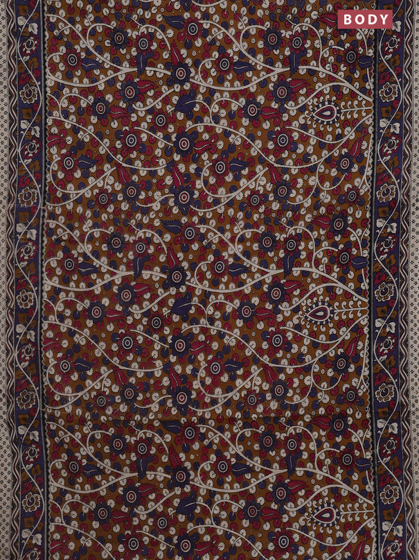 Kalamkari cotton saree dark mustard and blue shade with allover prints and printed border