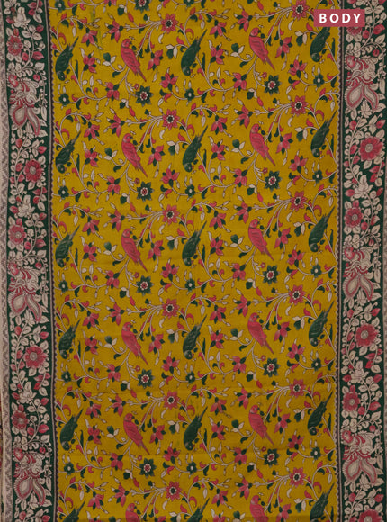 Kalamkari cotton saree yellow and green with allover prints and printed border