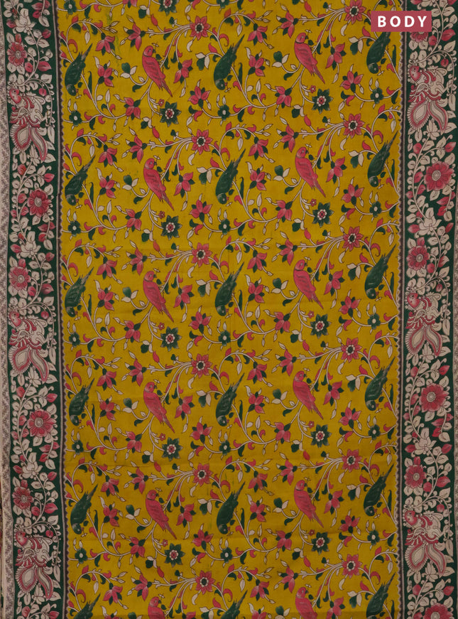 Kalamkari cotton saree yellow and green with allover prints and printed border