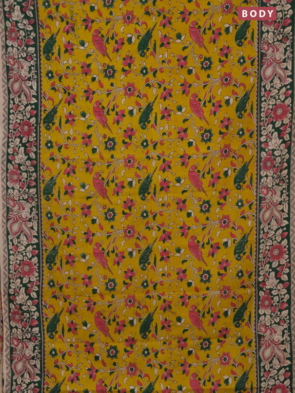 Kalamkari cotton saree yellow and green with allover prints and printed border
