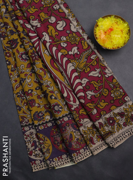 Kalamkari cotton saree yellow and violet with allover prints and printed border