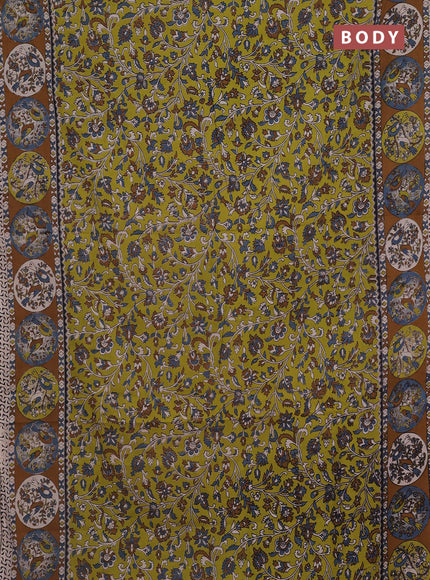 Kalamkari cotton saree light green and dark mustard with allover prints and printed border