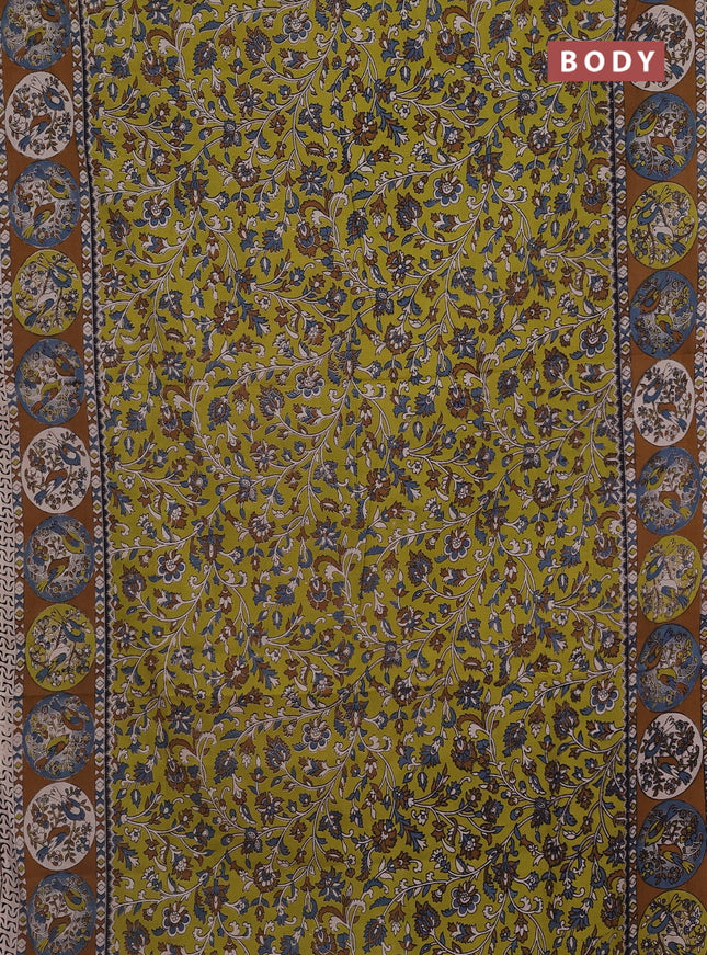 Kalamkari cotton saree light green and dark mustard with allover prints and printed border