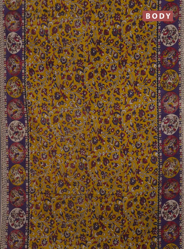 Kalamkari cotton saree yellow and violet with allover prints and printed border