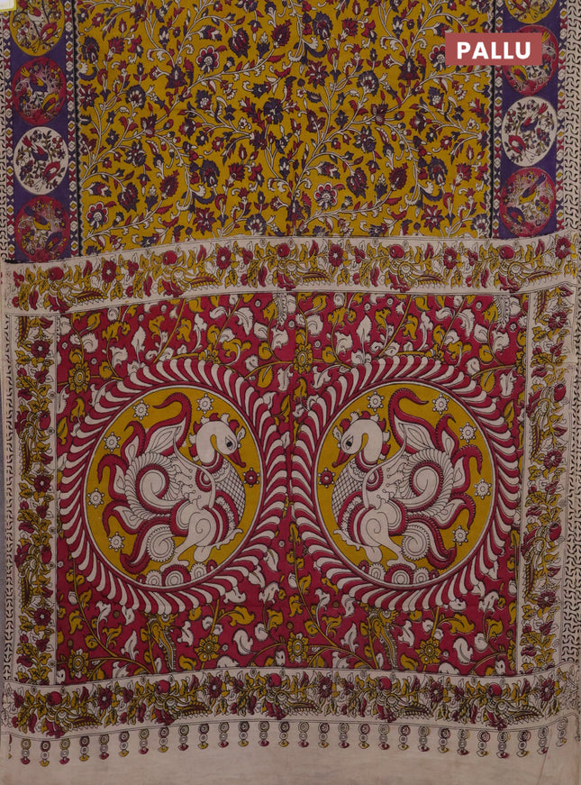 Kalamkari cotton saree yellow and violet with allover prints and printed border