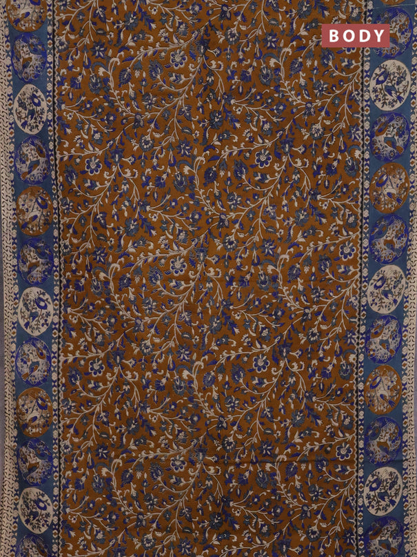 Kalamkari cotton saree dark mustard and greyish blue with allover prints and printed border
