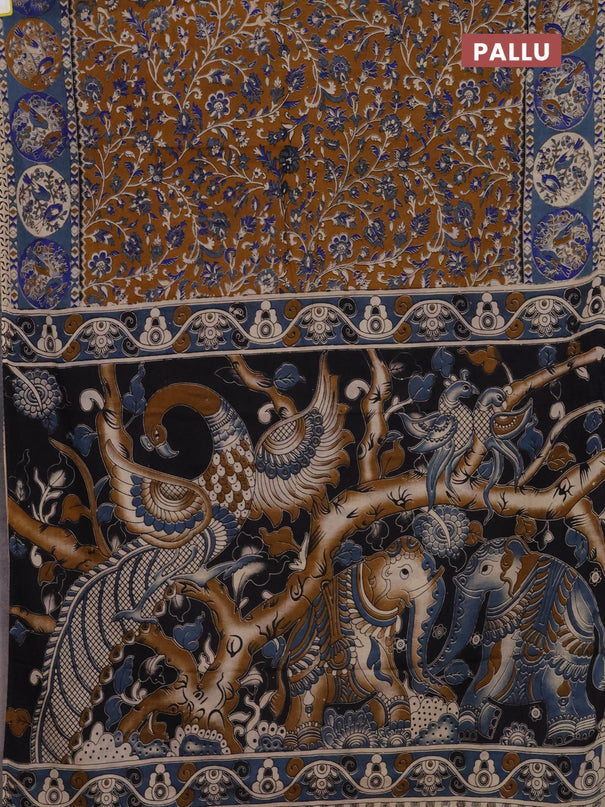 Kalamkari cotton saree dark mustard and greyish blue with allover prints and printed border