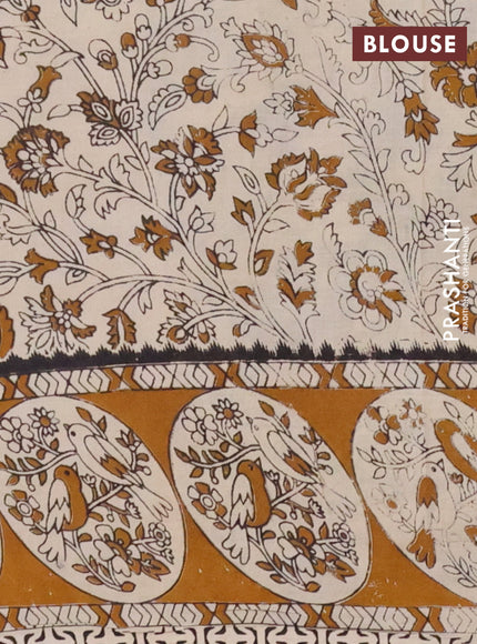 Kalamkari cotton saree cream and dark mustard with allover prints and printed border